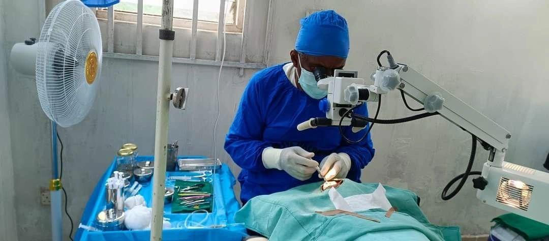 Elderly woman eye exam